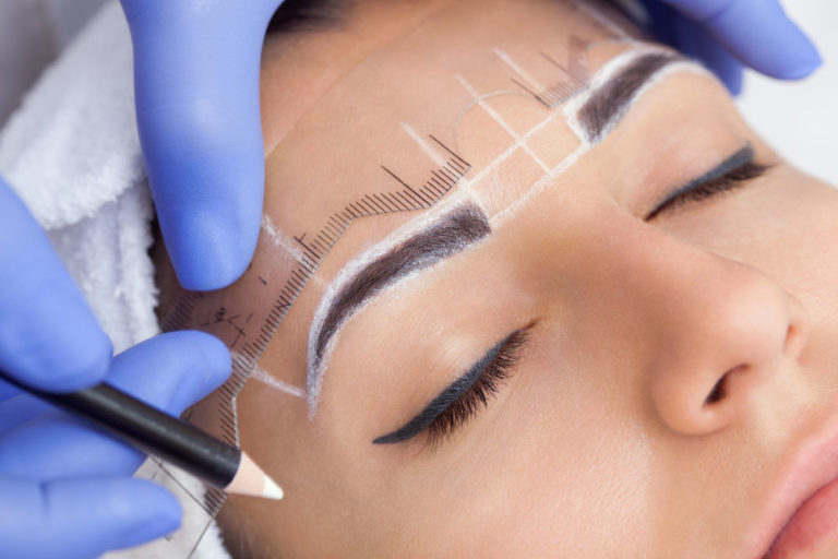 Prior to tattooing new brows, facial mapping ensures a correctly balanced composition